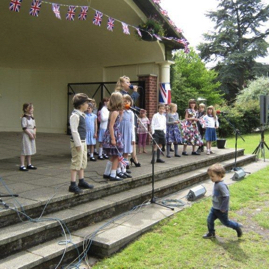 Maria Manchester and the school children