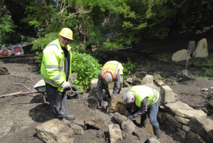 These are all showing the JGS volunteers working on rock arrangements and the watercourse during May and June 2017.